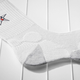 Illustration for article titled Can a Pair of Socks Really Make a Difference in Athletic Performance?